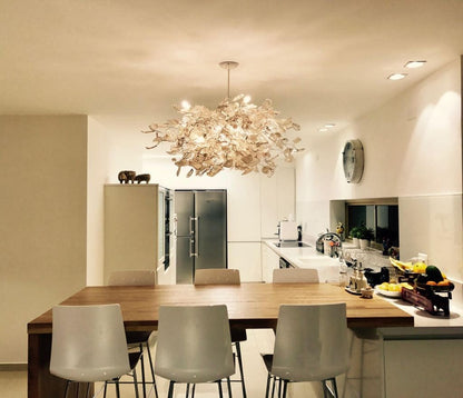 Hanging oval chandeliers with green clear yellow and purple flowers and leaves for Dining Room