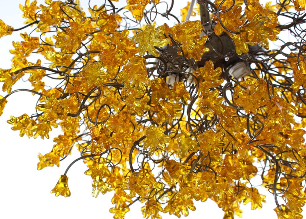Hanging ceiling light with yellow flowers for dining room.