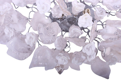 Silver Sconce With Whimsical Resin Leaves In clear and white color.