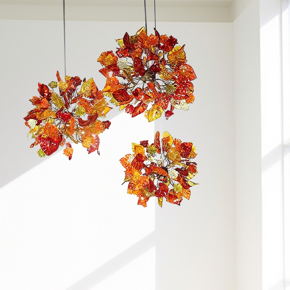 Triple Round Pendant Light With Autumn Colored Resin Leaves