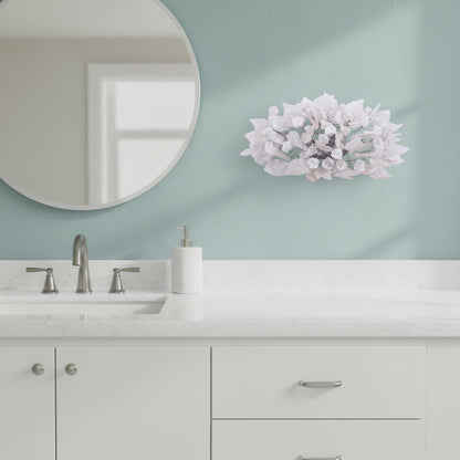 Silver Sconce With Whimsical Resin Leaves In clear and white color.