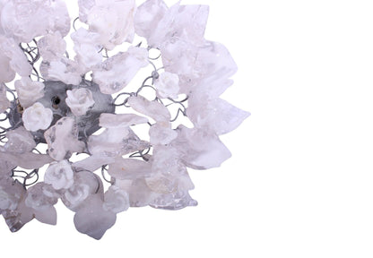 Silver Sconce With Whimsical Resin Leaves In clear and white color.