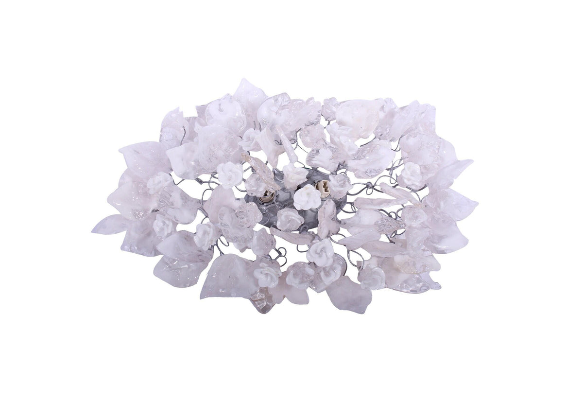 Silver Sconce With Whimsical Resin Leaves In clear and white color.